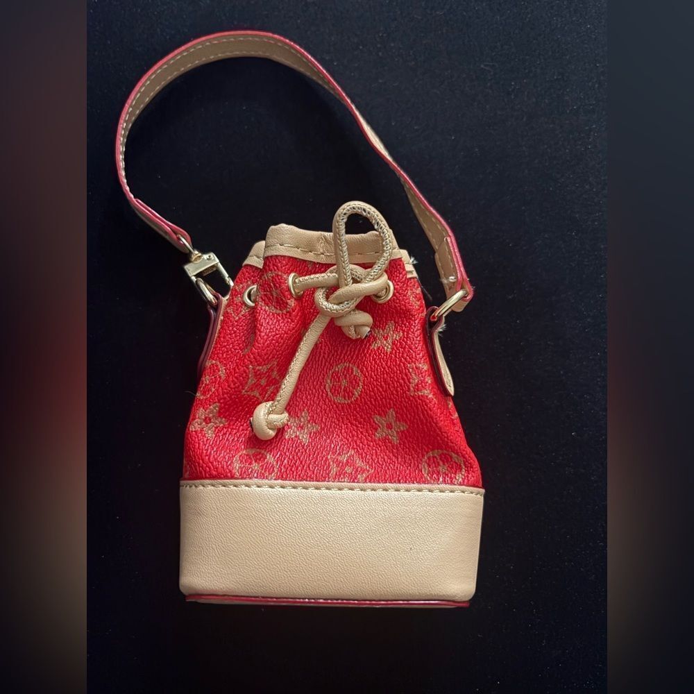 Mini unbranded bag charm can fit AirPod and ID /credit card